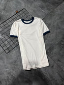 Camisa com detalhes nas m/golas